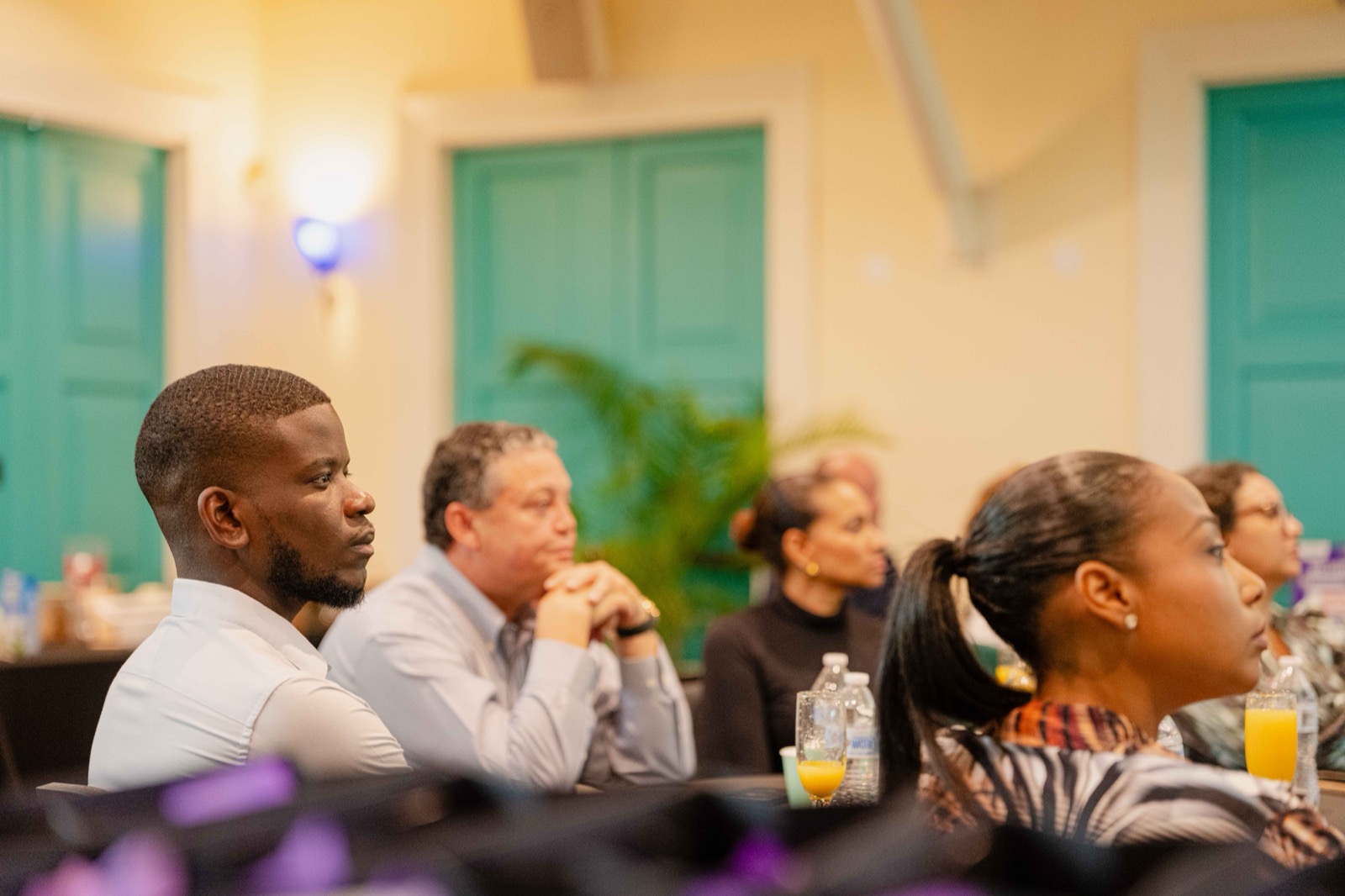 Audience members listening during the keynote